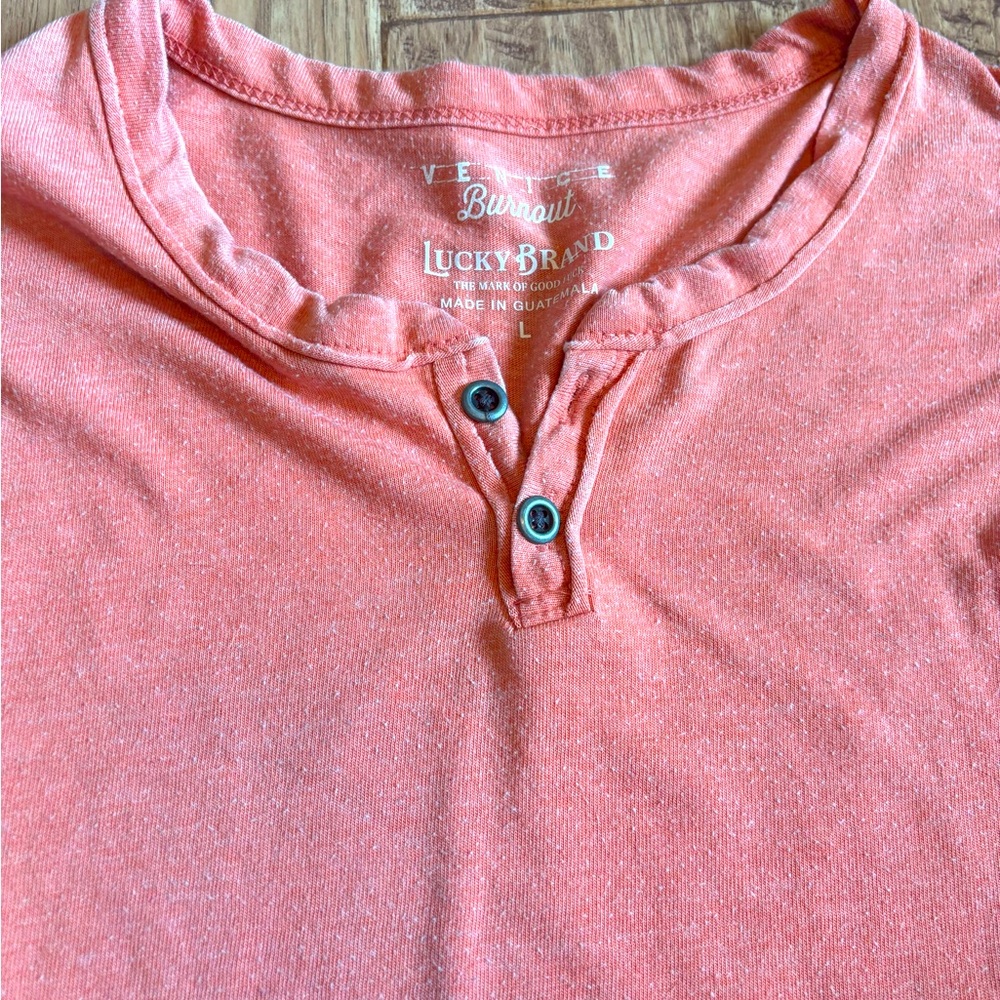 Lucky orange/coral burnout tee. Great condition!